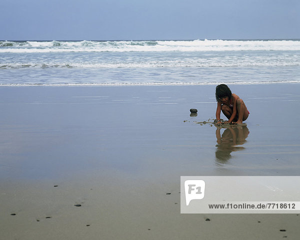 Girl Playing On Famara Beach  Famara Beach  Lanzarote  Canary Islands  Spain