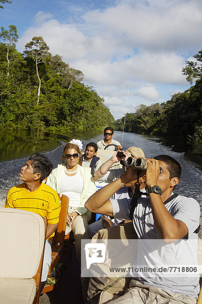 Tourist On Boat On Amazon Tributary