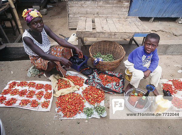 Woman And Child With Produce