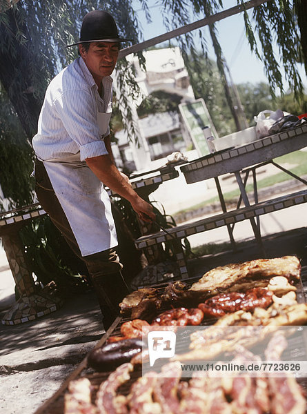 Man At Barbecue
