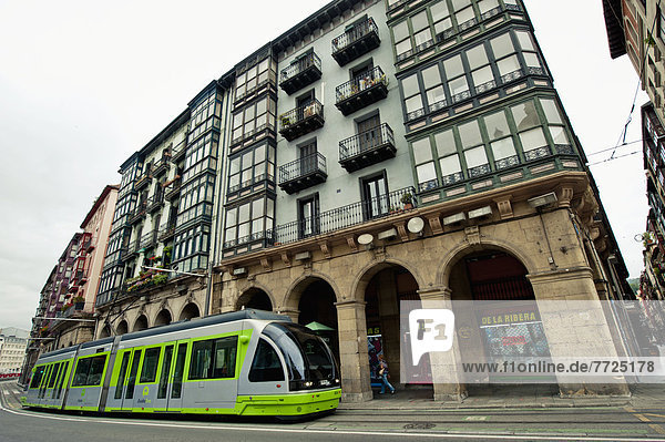 Modern Tram Passing The Old Quarter In Bilbao  Basque Country  Spain