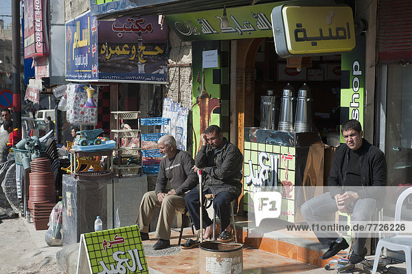People Sitting In Front Of Stores  Jordan  Middle East