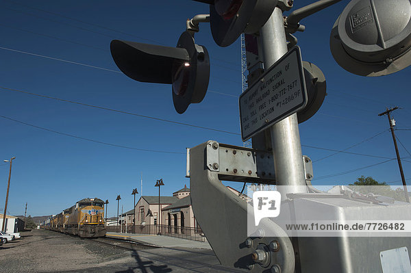 A Union Pacific Train At The Railway Crossing At Alpine Texas Usa