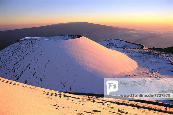 Hawaii  Big Island  Summit Of Mauna Kea Covered With Snow At Sunset  Mauna Loa In Background