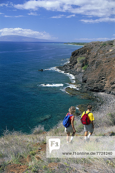 Hawaii  Maui  View From Behind Couple Hiking Coastline  Overlook Ocean  Lanai Background