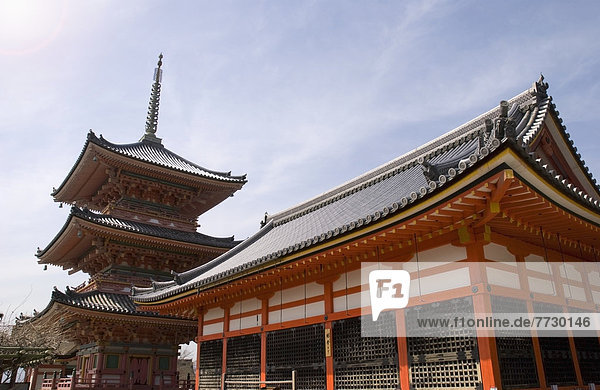 Pagoda And Red Building  Kyoto  Japan