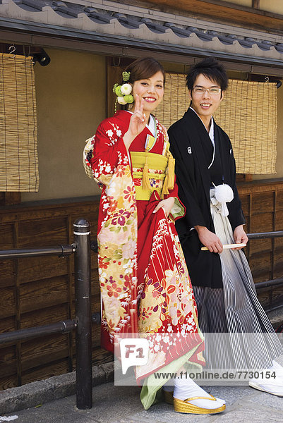 Young Japanese Couple In Traditional Wedding Kimonos  Kyoto  Japan