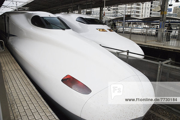 Two Bullet Trains From The Front In A Station  Tokyo  Japan