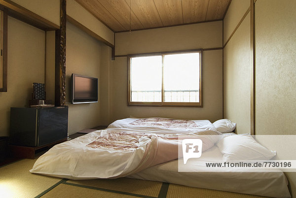 Traditional Japanese Bedroom With Tatami Floor And Futon Beds  Takayama  Gifu  Japan