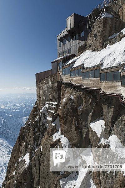 A Building With Windows Built Into The Mountain Of The French Alps  Chamonix-Mont-Blanc Rhone-Alpes France