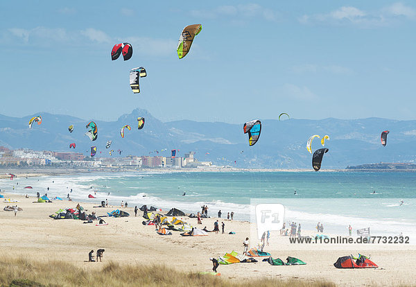 Kitesurfing along the coast  tarifa cadiz andalusia spain