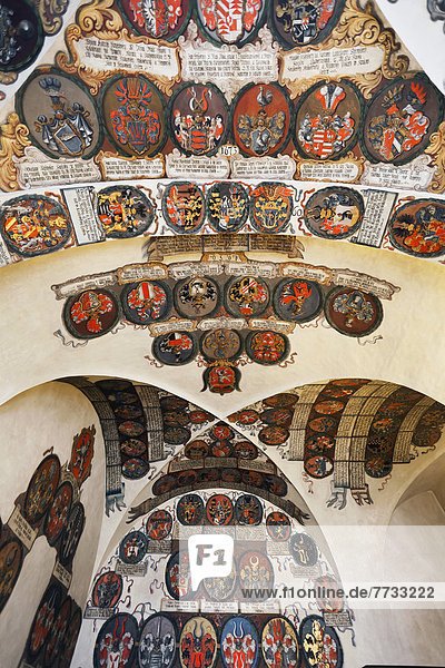 Czech Republic  Colorful crests displayed on curved ceiling and walls  Prague
