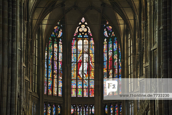 Czech Republic  Colorful stained glass windows with depiction of religious figures  Prague