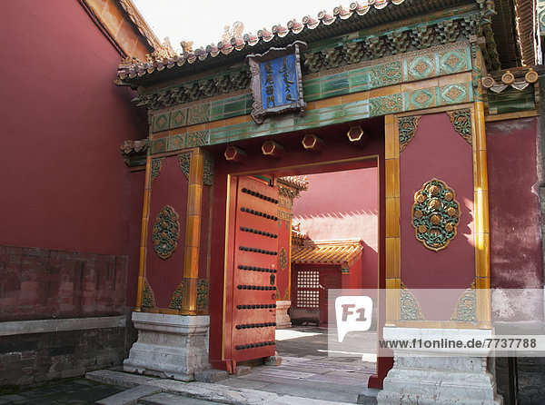 Red building with colourful and ornate design with chinese architecture Forbidden city beijing china