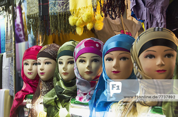 Mannequins dressed in colourful head scarves and shawls in old medina Casablanca morocco