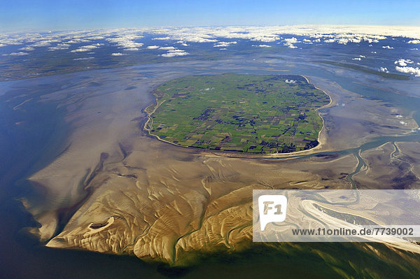 Aerial view  shipping traffic on the river Elbe in icy conditions