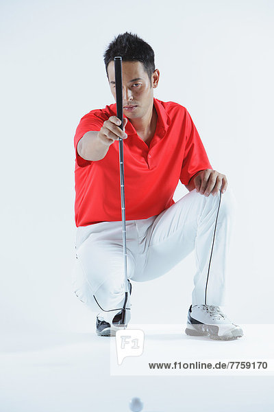 Golfer Preparing