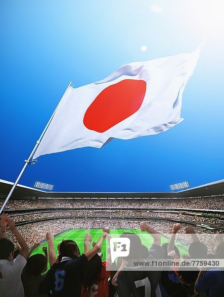 Crowd In Football Stadium with Japan Flag