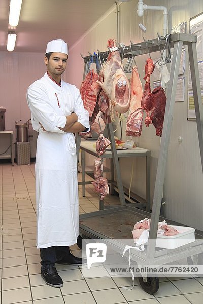 France  supermarket  young butcher.