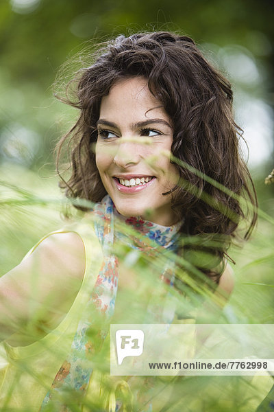 Portrait of young smiling woman  outdoors