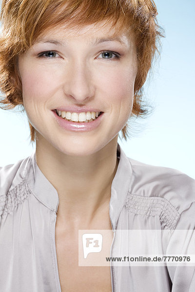 Portrait of young smiling woman