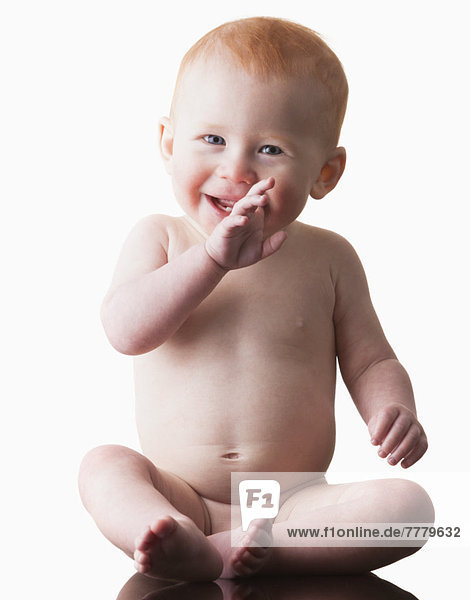 Studio shot of naked baby boy (18-23 months)