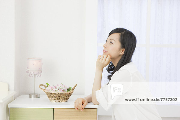 Young woman thinking