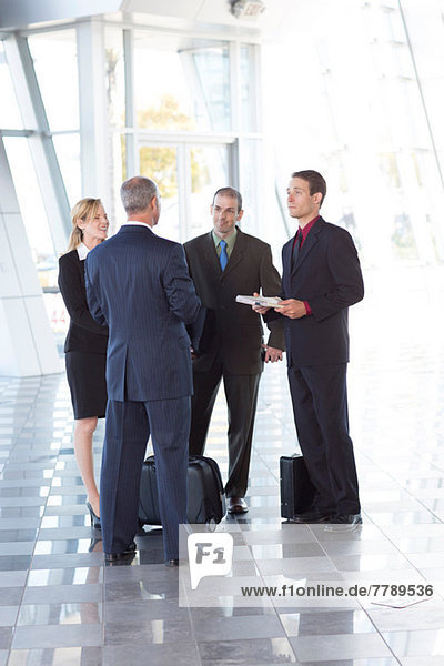 Businesspeople meeting in airport