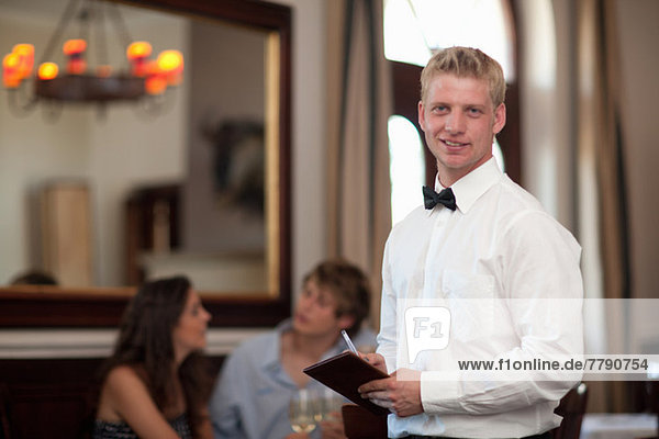 Waiter in restaurant