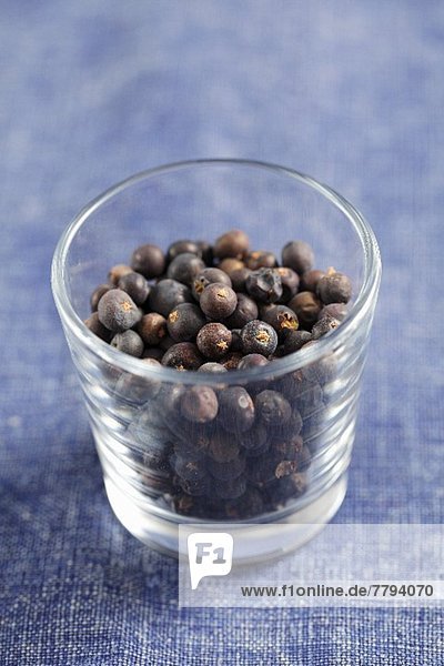 Juniper berries in a glass