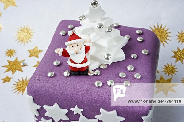 Weihnachtsmann hoch oben sternförmig Modell halten weiß lila Eiscreme Eis Sterne