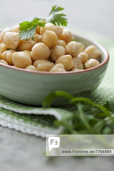Chickpeas in a bowl with parsley