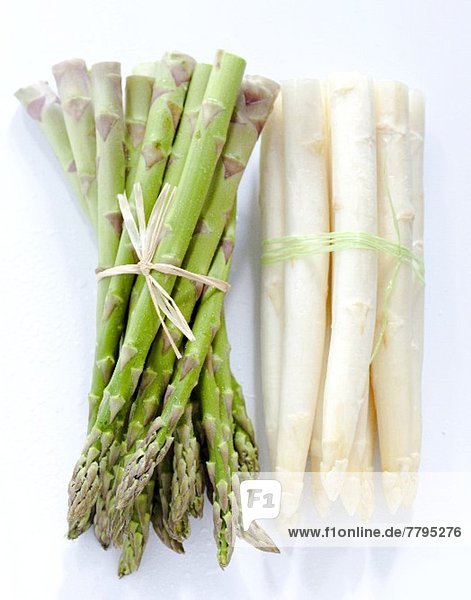 Bunches of green and white asparagus