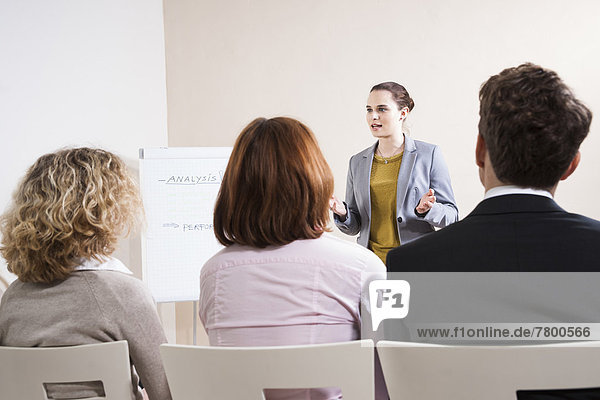 Woman giving Business Presentation