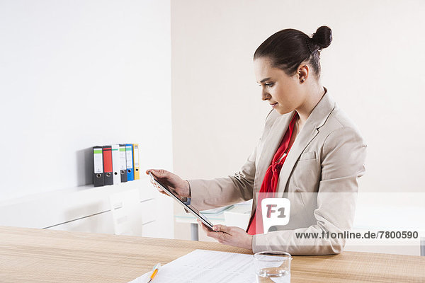 Young Woman Working in Office