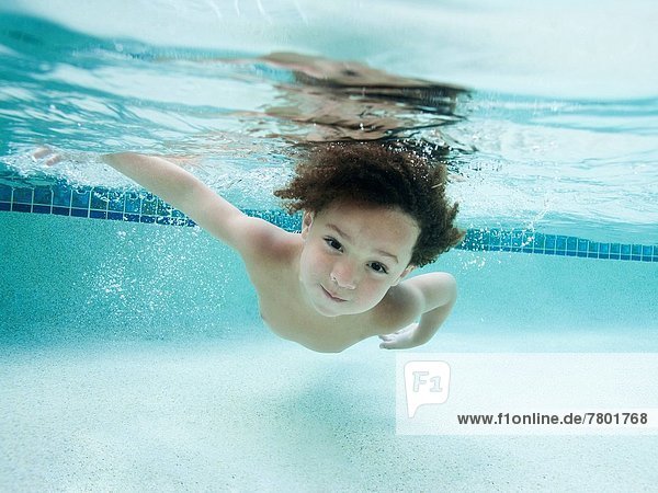 USA Utah Orem Boy (4-5) swimming in swimming pool