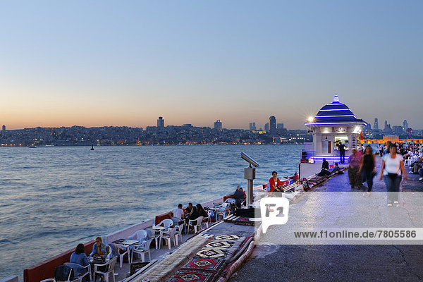 Evening mood  promenade on the Bosphorus  Besiktas at the rear