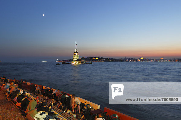 Evening mood  view towards Ueskuedar over the Bosphorus with Maiden's Tower or Leander's Tower  K?z Kulesi