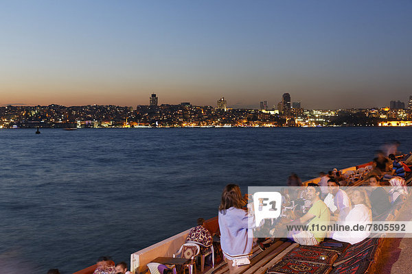 Evening mood  promenade on the Bosphorus  Beyoglu and Sisli at the rear