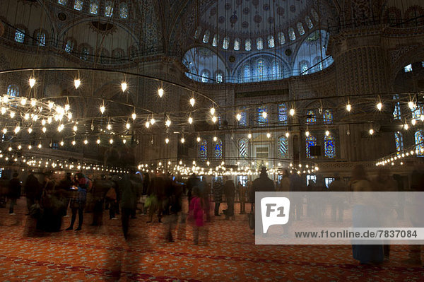 Tourists in the Blue Mosque  Istanbul  Turkey