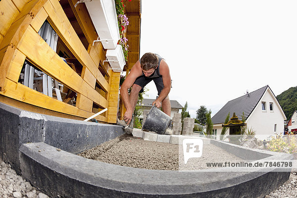 Germany,  Rhineland Palatinate,  Worker assembling concrete