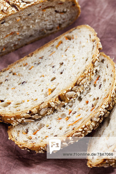 Whole grain bread with carrots  close up
