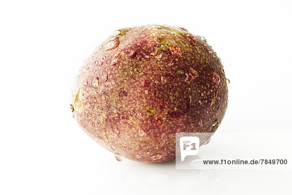 Passion fruit on white background  close up