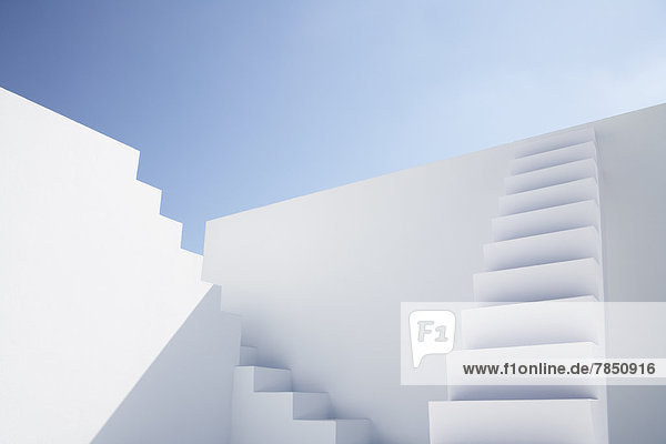White modern stairs of corporate business against blue sky