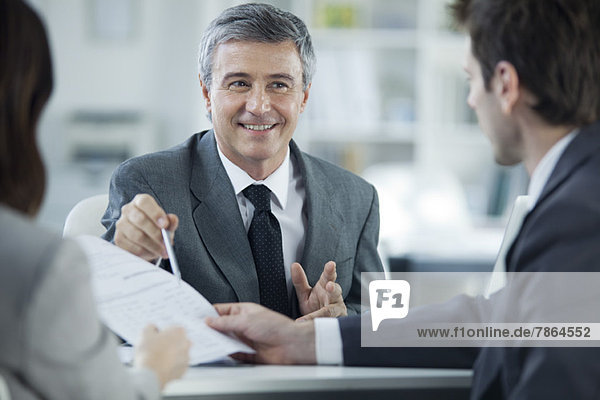 Businessman meeting with clients