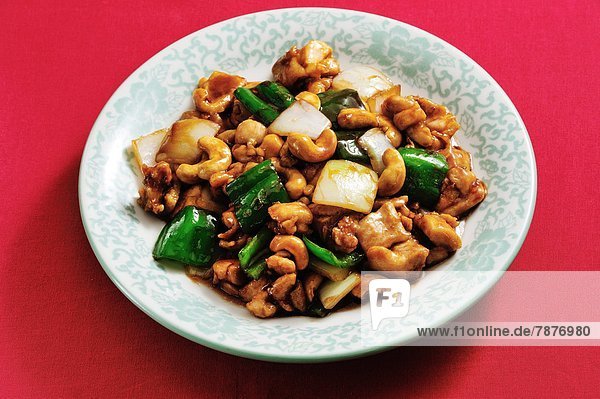 Huhn  Gallus gallus domesticus  Nuss  Cashewnuss  fettgebraten