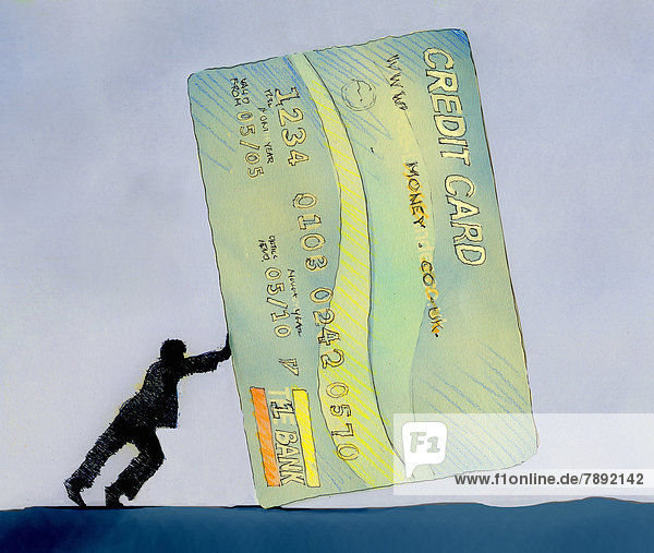Mann schiebt eine große Kreditkarte