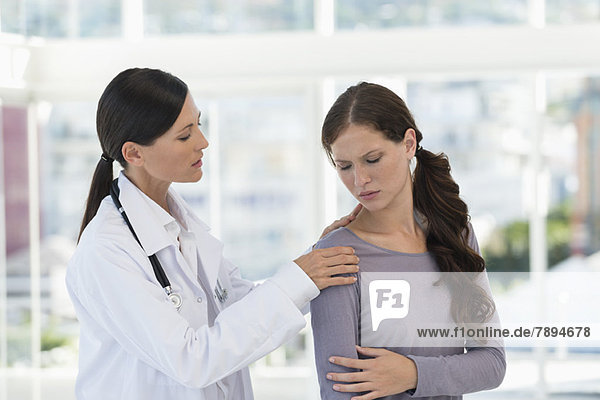 Female doctor examining a patient