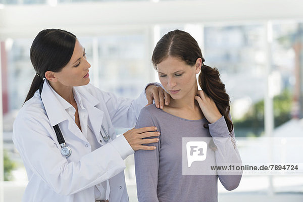 Female doctor examining a patient