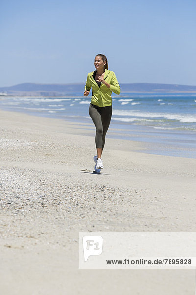Woman jogging on the beach